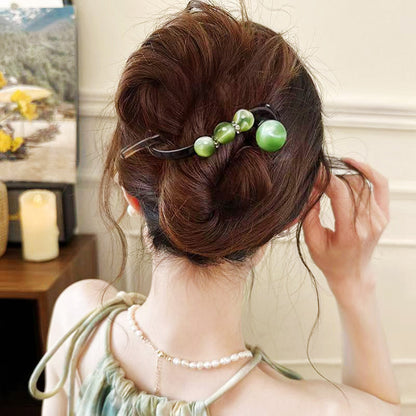 Élégante pince à cheveux pour les coiffures en arrière