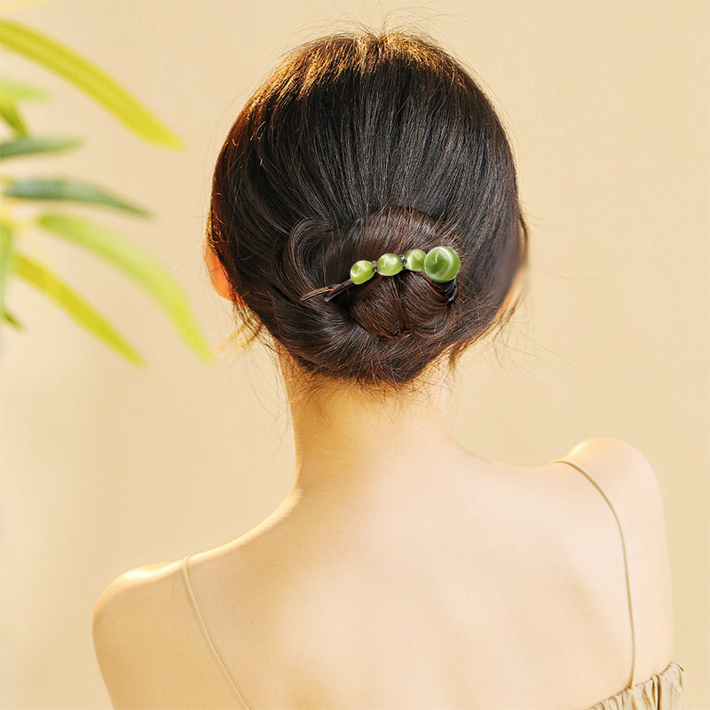 Élégante pince à cheveux pour les coiffures en arrière